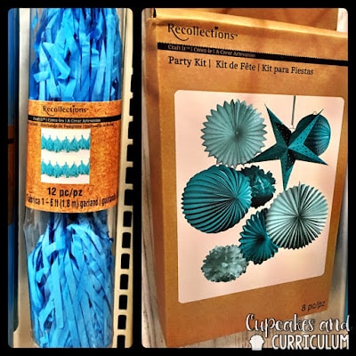 Pom-pom garlands and hanging paper star decor from Michaels for classroom ceilings
